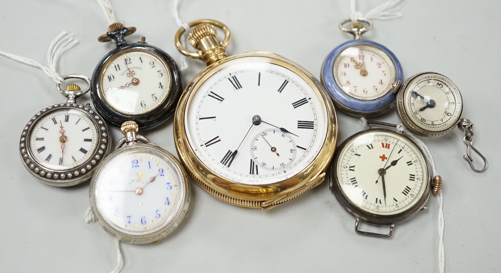 A gold plated open face pocket watch, a silver wrist watch, three fob watches including Art Nouveau 935 and enamelled and a globe watch.